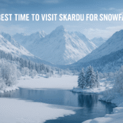 Snow-covered Skardu valley with frozen lake and Karakoram mountains during peak winter snowfall season in Gilgit-Baltistan, Pakistan.